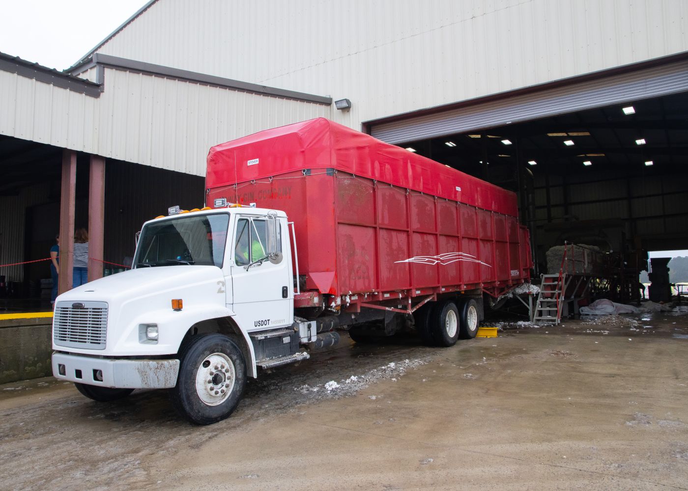 Quote comparison: truck near warehouse. Illustrative stock photo.